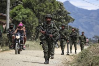 Plusieurs milliers de jeunes gens, pour la plupart issus de milieux pauvres, ont été assassinés durant le conflit qui a opposé les forces armées du pays avec des guérillas d'extrême gauche (image d'illustration). KEYSTONE/AP/Santiago Saldarriaga